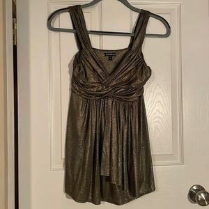 Ladies Express sleeveless extra small top with a sparkling gold and black
